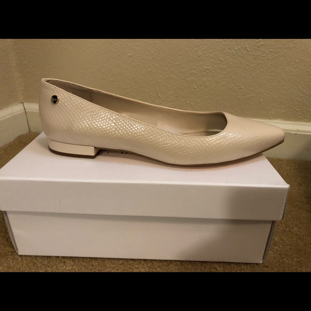 New! Calvin Klein beige patent flats size 7.5